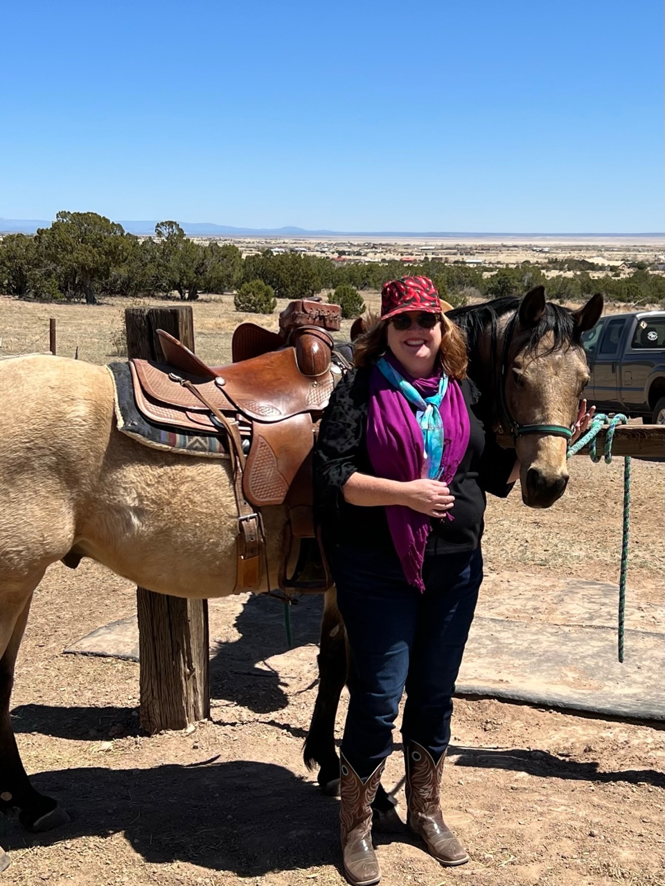 Stacey visiting her family and beloved horses in New Mexico